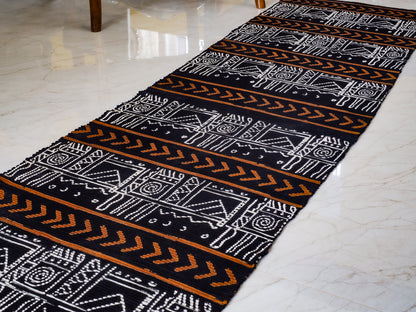 Floor Covering with various block prints and arrows in black white and yellow 
